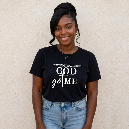 Black Christian t-shirt with white text I'm not worried God got me with cross design - cropped front view